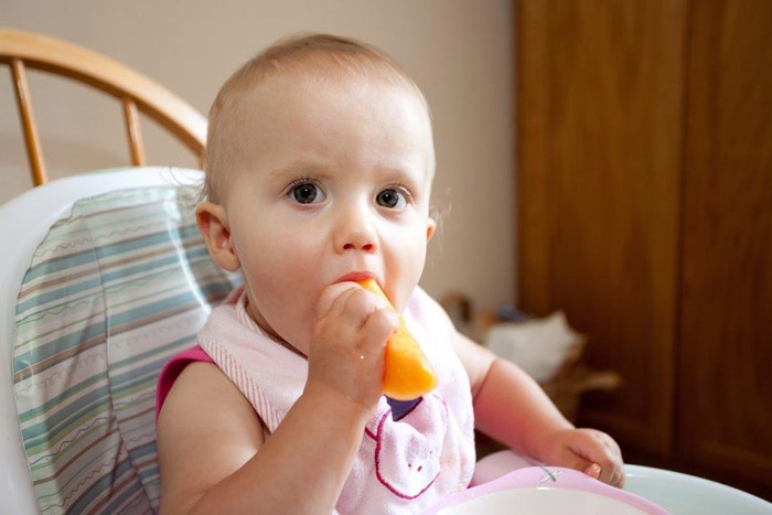 shutterstock-baby-with-cantaloupe