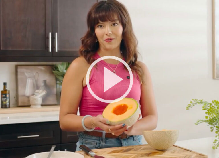 woman with cantaloupe